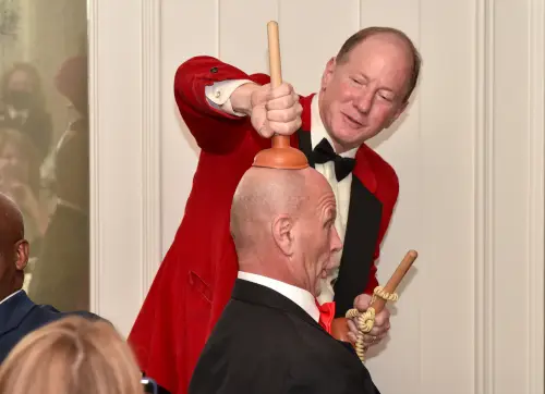 comedy magic-plunger red bow tie