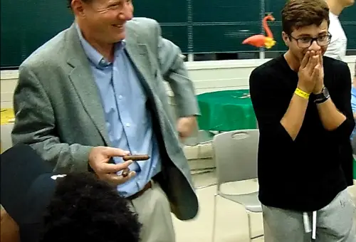 St. Louis comedy after prom grad party standup stage and closeup magician Jeff Lefton performing for smiling teens